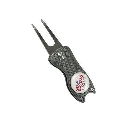 Button-Release Divot Tool